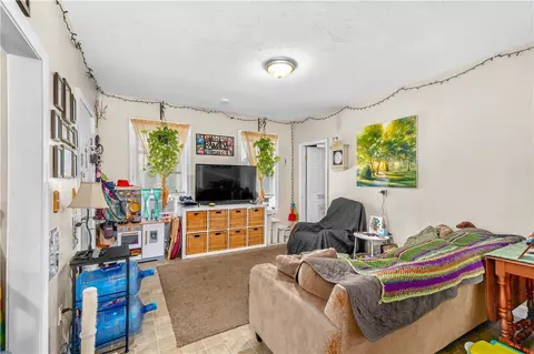 Living - 553 Fairmount St, Woonsocket, RI 02895 photo 1 of 2
