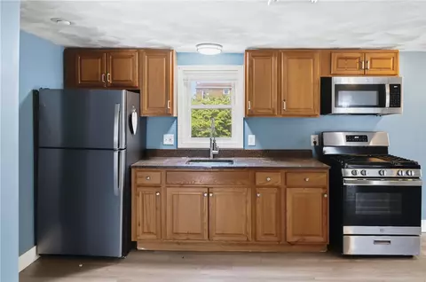 Kitchen - 41 Grove St, Woonsocket, RI 02895 photo 3 of 5