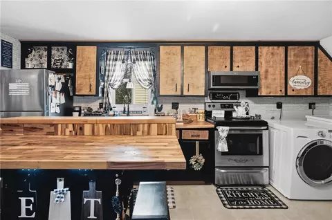 Kitchen - 41 Grove St, Woonsocket, RI 02895 photo 2 of 5