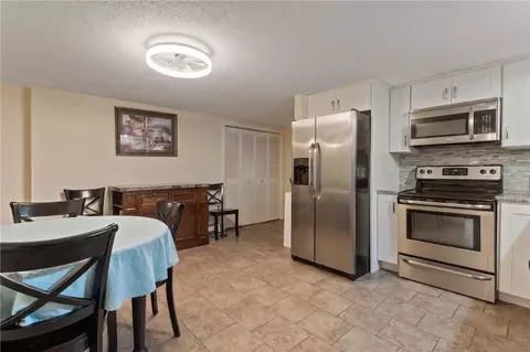 Kitchen - 76 Dewey St, Woonsocket, RI 02895 photo 2 of 2