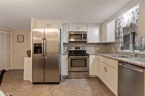 Kitchen - 76 Dewey St, Woonsocket, RI 02895 photo 1 of 2