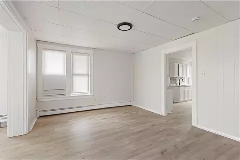 Living - 409 Rathbun St, Woonsocket, RI 02895 photo 4 of 17