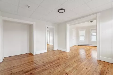 Living - 409 Rathbun St, Woonsocket, RI 02895 photo 16 of 17
