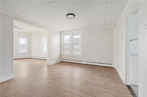 Living - 409 Rathbun St, Woonsocket, RI 02895 photo 11 of 17