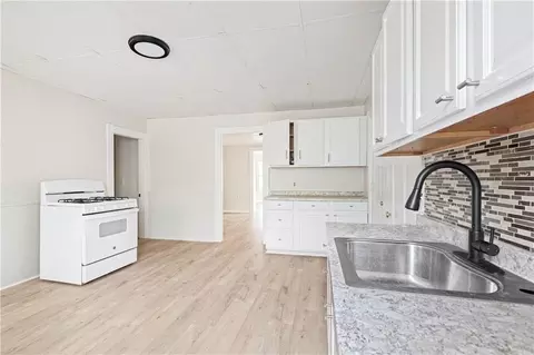 Kitchen - 409 Rathbun St, Woonsocket, RI 02895 photo 3 of 3