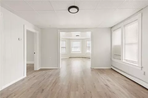 Living - 409 Rathbun St, Woonsocket, RI 02895 photo 7 of 17