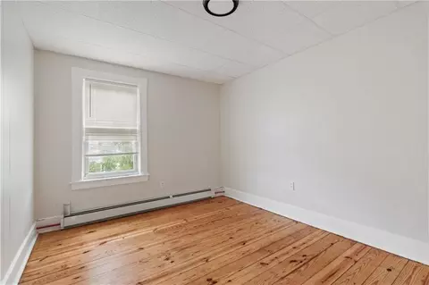Bedroom - 409 Rathbun St, Woonsocket, RI 02895 photo 10 of 12