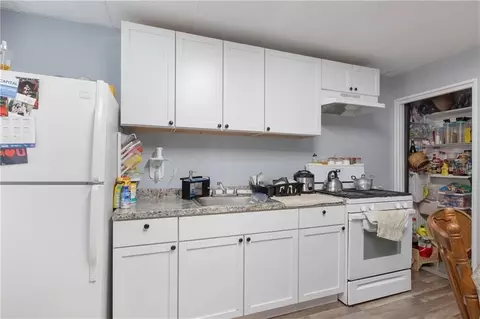 Kitchen - 409 Rathbun St, Woonsocket, RI 02895 photo 1 of 3