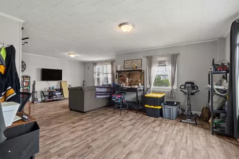 Living - 124 Lincoln St, Woonsocket, RI 02895 photo 1 of 9