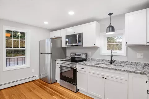 Kitchen - 677 Cass Ave, Woonsocket, RI 02895 photo 4 of 5