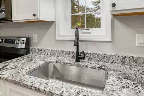 Kitchen - 677 Cass Ave, Woonsocket, RI 02895 photo 3 of 5
