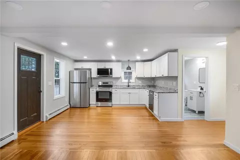 Living - 677 Cass Ave, Woonsocket, RI 02895 photo 1 of 5