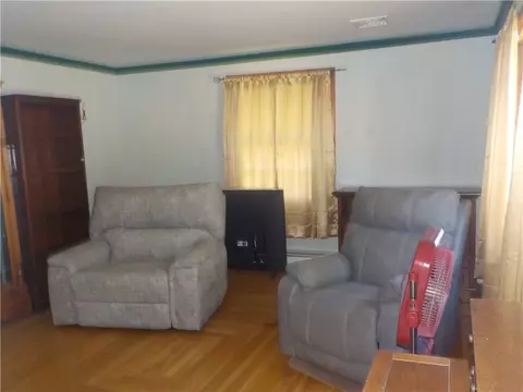 Living - 62 Langevin St, Woonsocket, RI 02895 photo 1 of 1