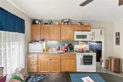 Kitchen - 56 Summit St, Woonsocket, RI 02895 photo 2 of 2