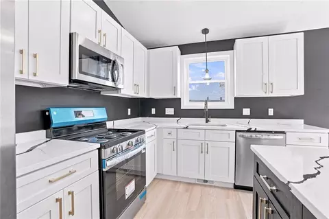 Kitchen - 209 Lincoln St, Woonsocket, RI 02895 photo 2 of 2