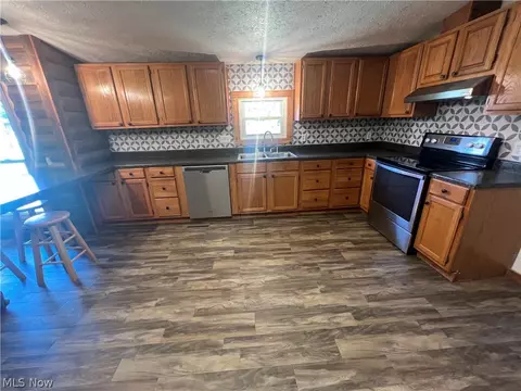 Kitchen - 5476 Rutledge St, Dennison, OH 44621 photo 2 of 4