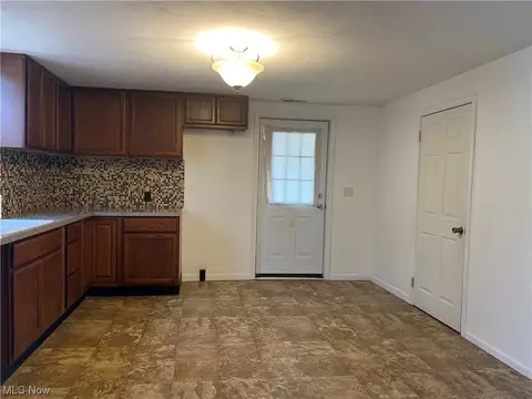 Kitchen - 306 N 3rd St, Dennison, OH 44621 photo 3 of 4