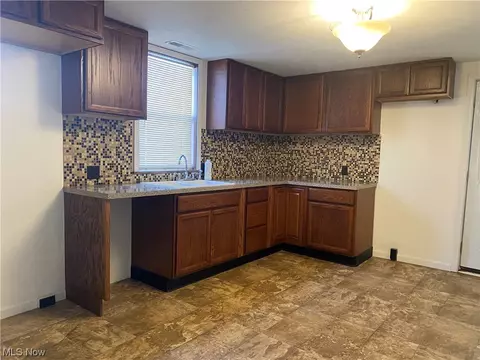 Kitchen - 306 N 3rd St, Dennison, OH 44621 photo 2 of 4