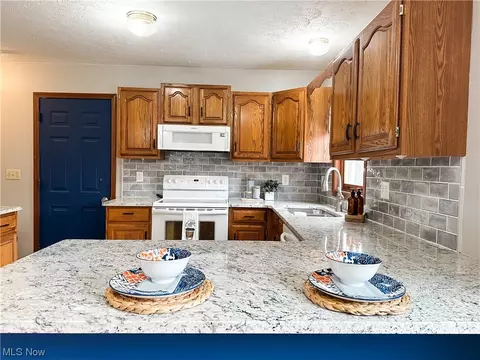 Kitchen - 318 Everson Rd, Belpre, OH 45714 photo 2 of 6