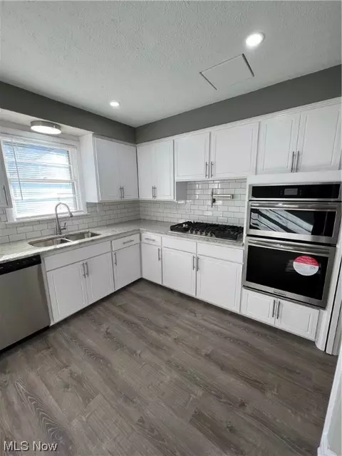 Kitchen - 19306 Libby Rd, Maple Heights, OH 44137 photo 3 of 5