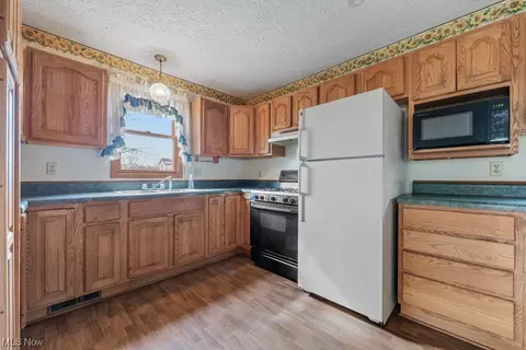 Kitchen - 266 E Oregon Ave, Sebring, OH 44672 photo 1 of 2