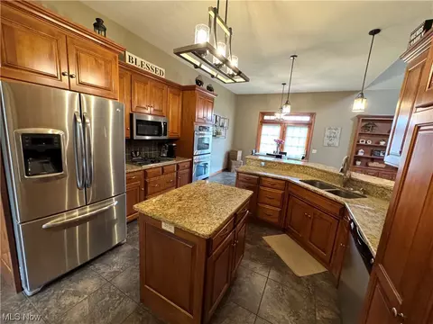 Kitchen - 721 E 12th St, Dover, OH 44622 photo 2 of 3