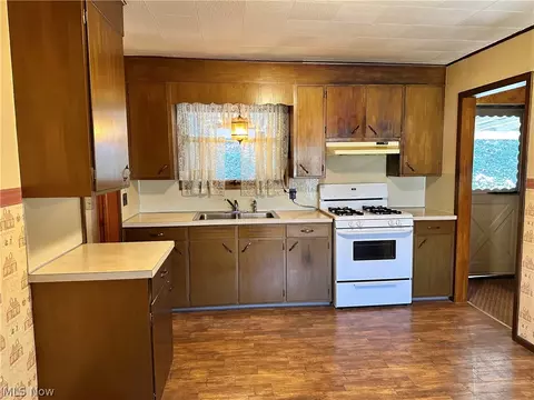 Kitchen - 105 School Hl, Killbuck, OH 44637 photo 2 of 2