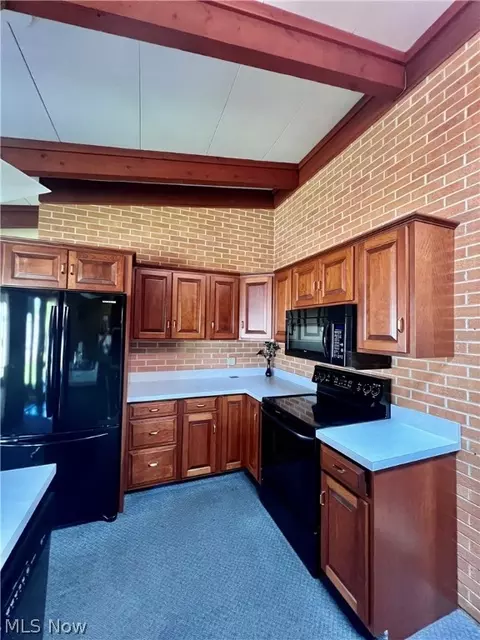 Kitchen - 500 E Iron Ave, Dover, OH 44622 photo 2 of 4