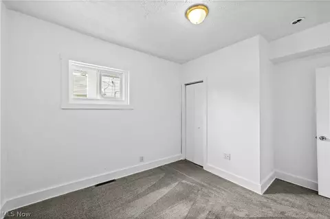 Bedroom - 1306 West Ave, Elyria, OH 44035 photo 3 of 10