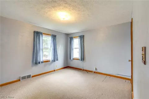 Bedroom - 708 Grove St NE, Canton, OH 44721 photo 2 of 7