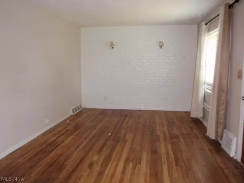 Living - 605 Eastern Heights Blvd, Elyria, OH 44035 photo 2 of 3