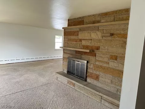Living - 141 Roosevelt Ave, Elyria, OH 44035 photo 6 of 15