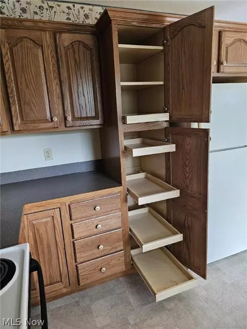 Kitchen - 705 University Ave, Elyria, OH 44035 photo 2 of 3