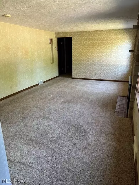 Living - 2430 Midvale Rd NW, Canton, OH 44708 photo 6 of 8