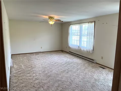 Living - 163 Allison Ave, Killbuck, OH 44637 photo 1 of 2