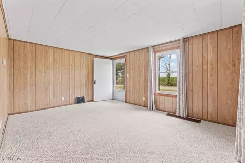 Living - 16844 W Pine Lake Rd, Beloit, OH 44609 photo 2 of 2