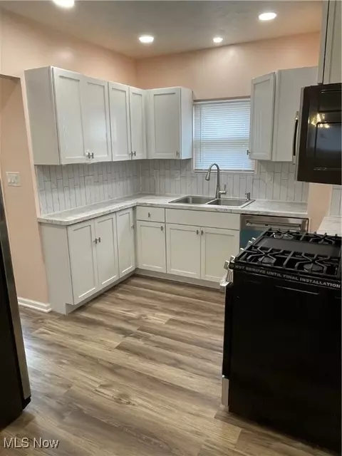 Kitchen - 5183 Thomas St, Maple Heights, OH 44137 photo 2 of 3