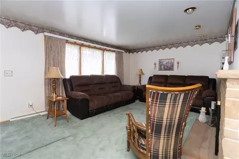 Living - 6989 Rolling Ridge Rd NE, Canton, OH 44721 photo 1 of 3