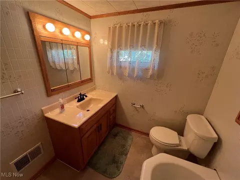 Bath - 321 E 10th St, Dover, OH 44622 photo 2 of 2
