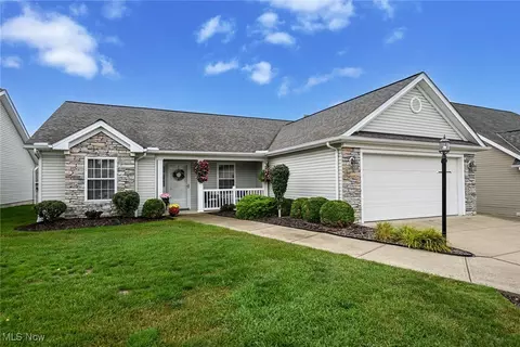 Exterior - 320 Falling Leaf Dr, Seven Hills, OH 44131 photo 2 of 10