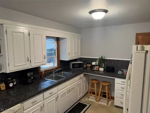 Kitchen - 1615 N Walnut St, Dover, OH 44622 photo 2 of 3