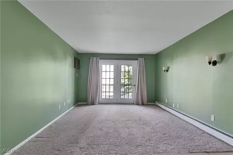 Living - 7398 Eisenhower Dr #4, Boardman, OH 44512 photo 2 of 2