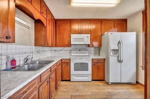 Kitchen - 223 State Route 58, Sullivan, OH 44880 photo 2 of 3