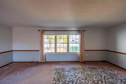 Living - 155 Doolin Dr, Williamstown, WV 26187 photo 2 of 9