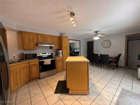 Kitchen - 26017 Hartley Rd, Beloit, OH 44609 photo 2 of 2