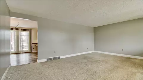 Living - 201 Schaar Dr, Dover, OH 44622 photo 1 of 3