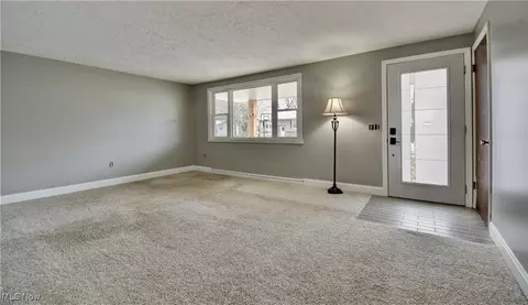 Living - 201 Schaar Dr, Dover, OH 44622 photo 2 of 3