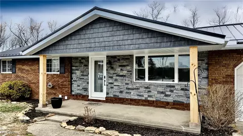 Exterior - 201 Schaar Dr, Dover, OH 44622 photo 3 of 10