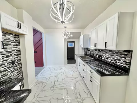 Kitchen - 2235 E 30th St, Lorain, OH 44055 photo 2 of 3
