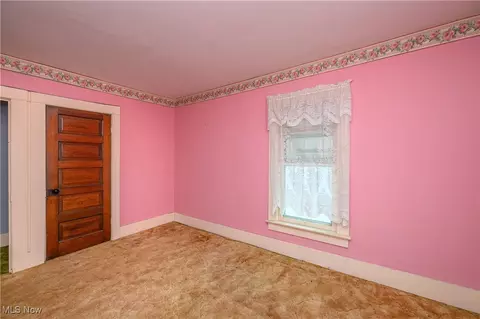 Bedroom - 319 Spring St, Dennison, OH 44621 photo 2 of 5
